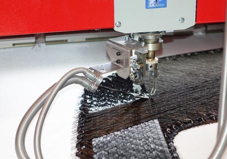 Additive Manufacturing with Tailored Fiber Placement